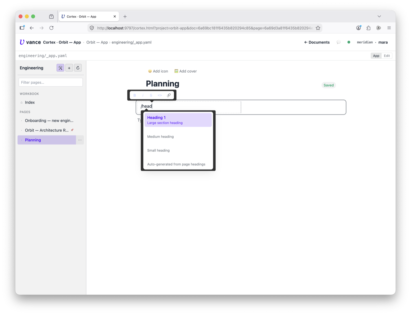 Workbook — the slash menu open on a page